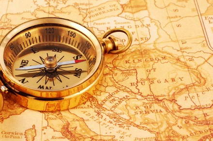 Photo of a Compass on a Map